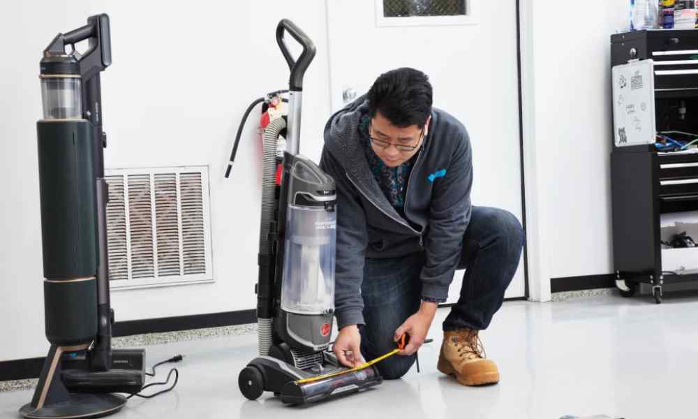 accessing the vacuum cleaner's conditioon to dispose of  a vacuum cleaner.