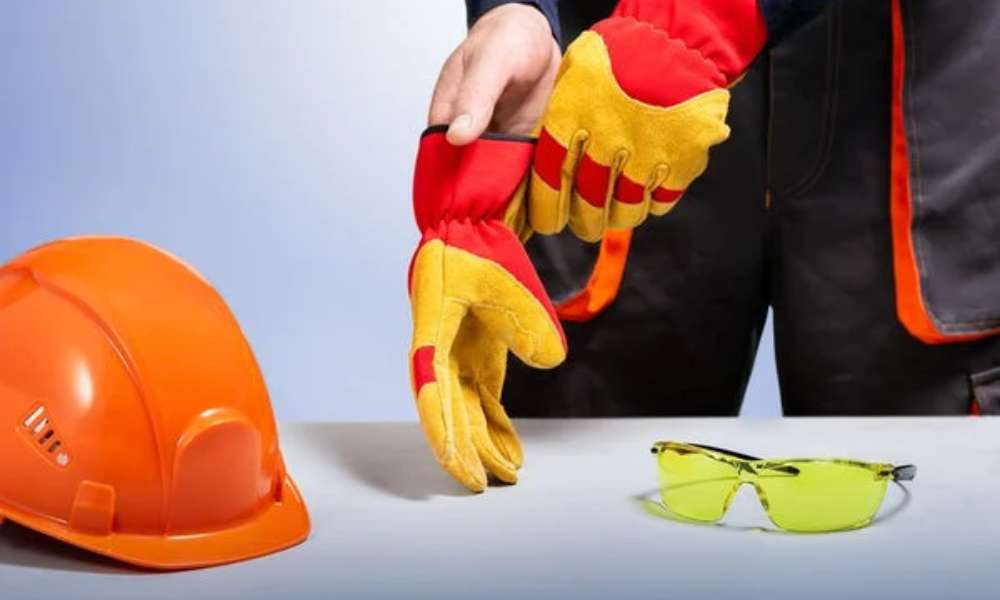 wearing safety gloves